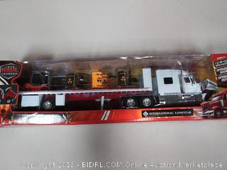 International Lone Star Flatbed with Radioactive Waste Barrels 1/32 Scale Model Toy Truck, Ages 8+