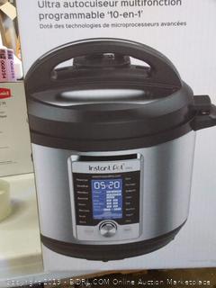 Instant Pot Ultra 8 Qt 10-in-1 Multi- Use Programmable Pressure Cooker, Slow Cooker, Rice Cooker, Yogurt Maker, Cake Maker, Egg Cooker, Sauté, Steamer, Warmer, and Sterilizer(small tent in back of machine)